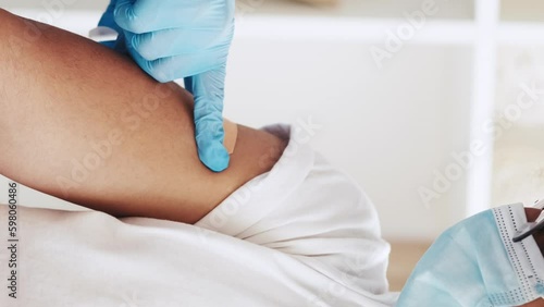 Vertical video. Flu vaccination. Disease prevention. Immunization injection. Doctor in gloves sticking adhesive bandage after jab shot to male patient arm shoulder. Generative AI