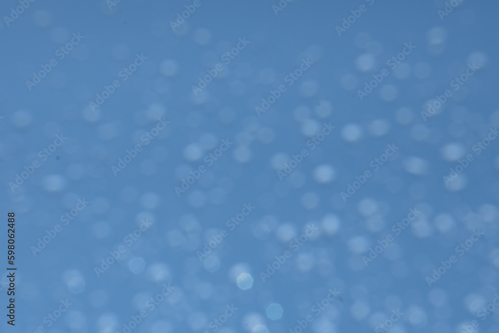 abstract blue background with hard bokeh