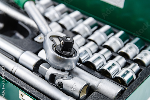 Socket set with socket wrench. Toolkit for the car maintenance