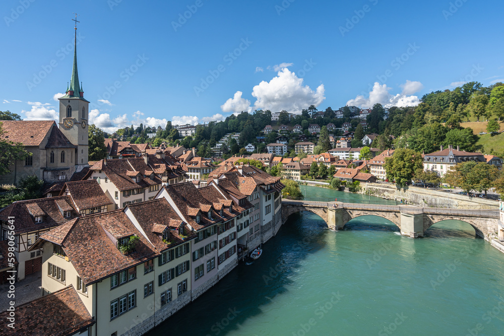Bern Old Town cityscape viewed form Nydegg Bridge above Aare River, Switzerland