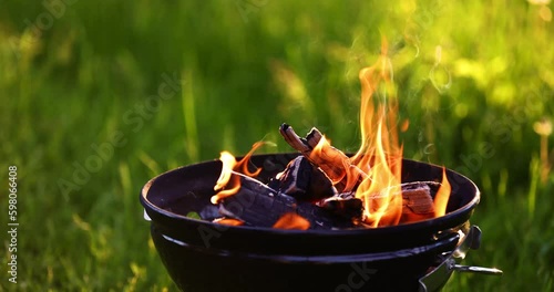 Barbecue Grill with Fire on Open Air. Fire flame