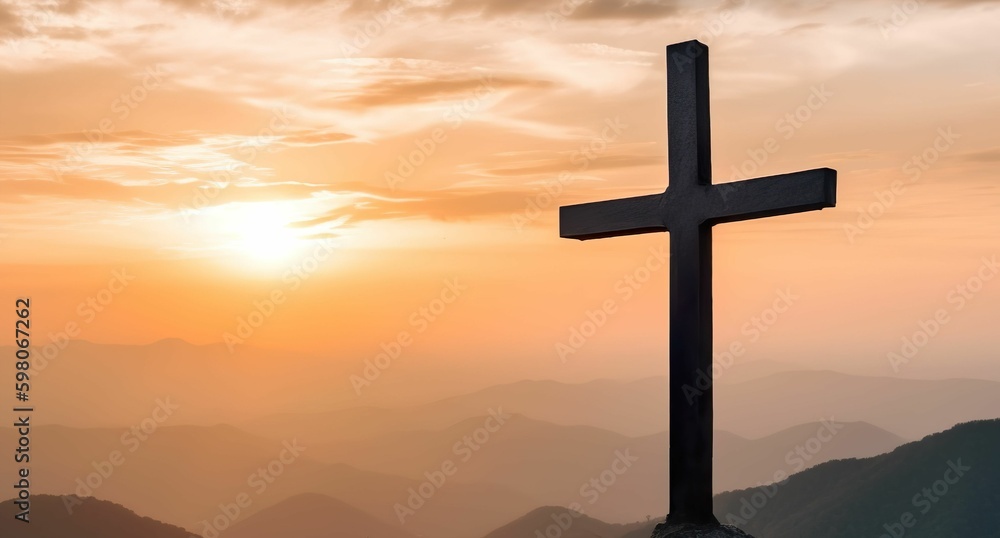 Crucifix on mountain at sunset sky background