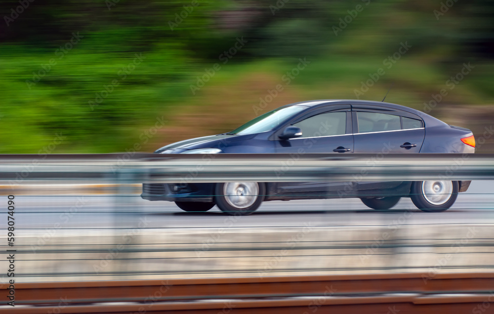 Car driving fast motion on highway side view Car driving fast motion on highway side view