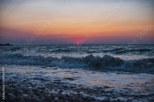 Sunset over Mediterranean Sea seen from a beach at Rhodes island © michal812