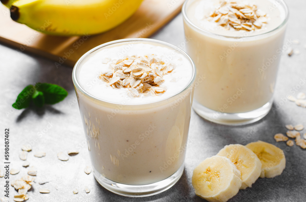Banana Smoothie with Oats, Healthy Food, Detox, Vegan or Vegetarian Diet Food Concept Banana Smoothie with Oats, Healthy Food, Detox, Vegan or Vegetarian Diet Food Concept