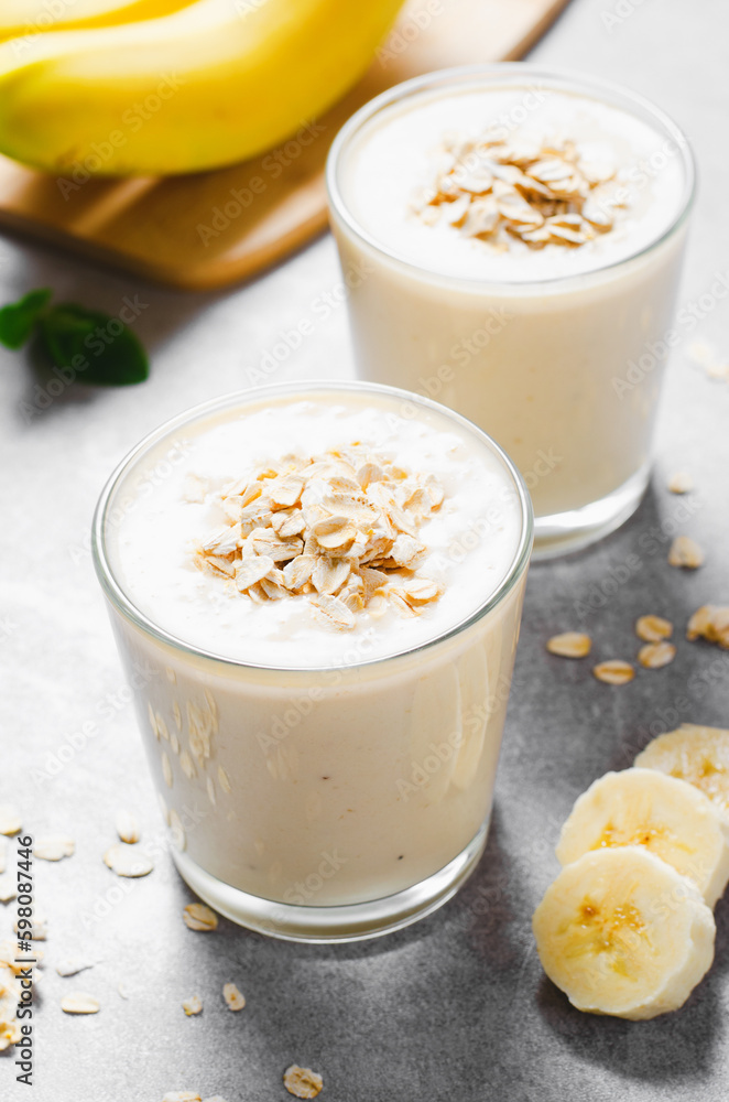 Banana Smoothie with Oats, Healthy Food, Detox, Vegan or Vegetarian Diet Food Concept Banana Smoothie with Oats, Healthy Food, Detox, Vegan or Vegetarian Diet Food Concept