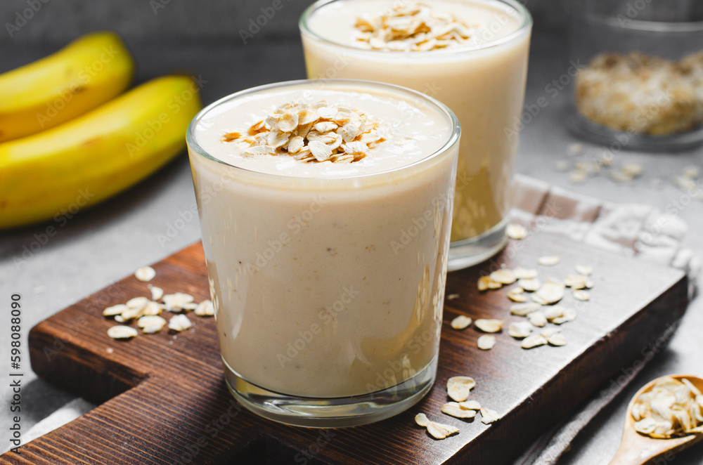 Banana Smoothie with Oats, Healthy Food, Detox, Vegan or Vegetarian Diet Food Concept Banana Smoothie with Oats, Healthy Food, Detox, Vegan or Vegetarian Diet Food Concept