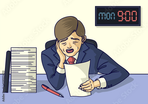 Young businessman yawning because lazy to work on monday.