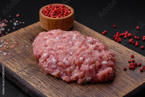 Raw minced beef, pork or chicken meat with salt, spices and herbs