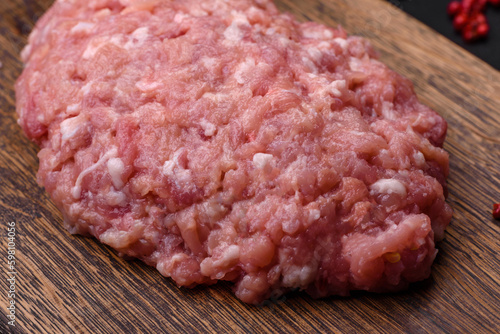Raw minced beef, pork or chicken meat with salt, spices and herbs