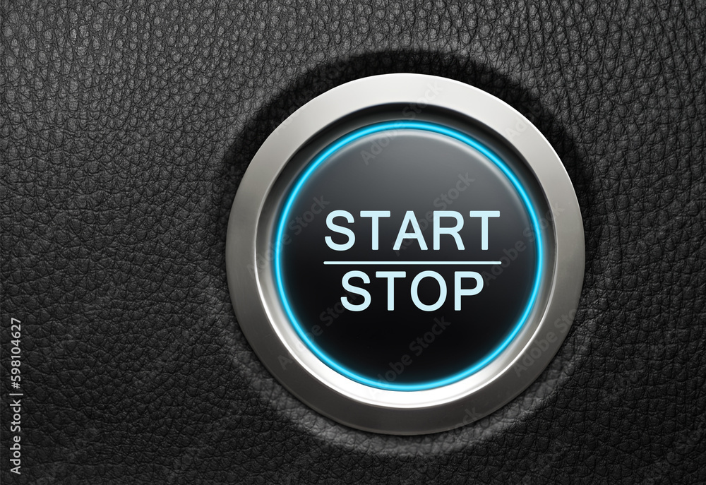 Engine start button with blue glowing ring on a modern car