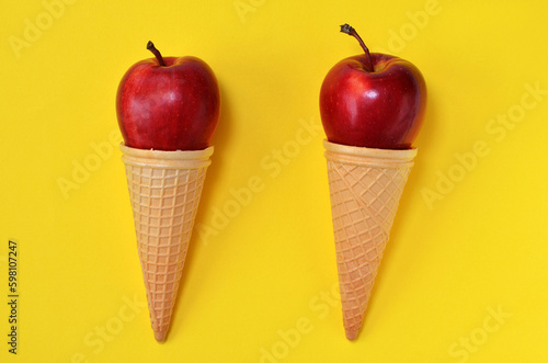 red apples in a waffle cone natural ice cream concept close-up photo