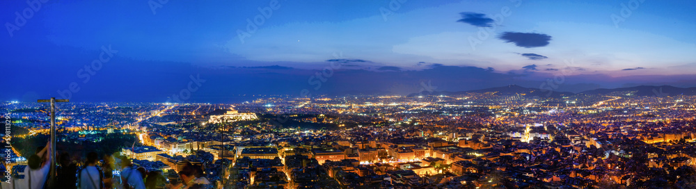 Panorama of night Great city Athens  - Greek capital with Acropolis and ships in bay