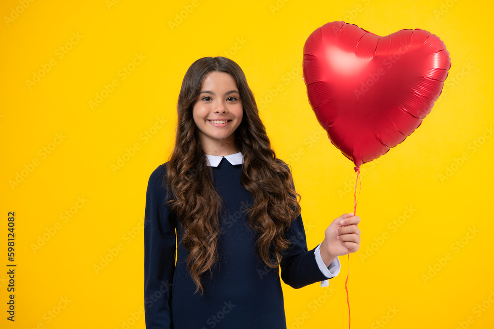 Happiness kids and love concept. Romantic lovely teen girl with red heart balloon, world heart day, happy valentines day. Happiness kids and love concept. Romantic lovely teen girl with red heart balloon, world heart day, happy valentines day.