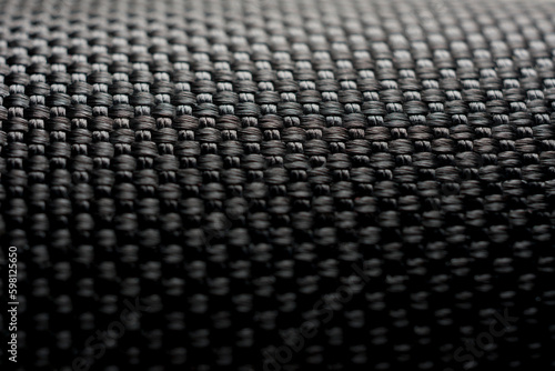 Black textile abstract pattern (macro photography)