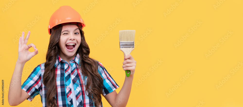 child painter in helmet. paint brush for decoration. kid education. renovation work. Child builder in helmet horizontal poster design. Banner header, copy space. child painter in helmet. paint brush for decoration. kid education. renovation work. Child builder in helmet horizontal poster design. Banner header, copy space.