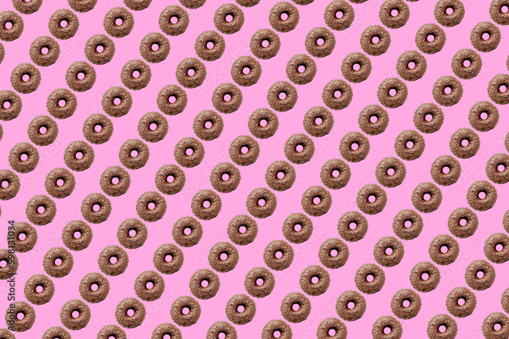 chocolate donuts on pink background small size chocolate donuts on pink background small size
