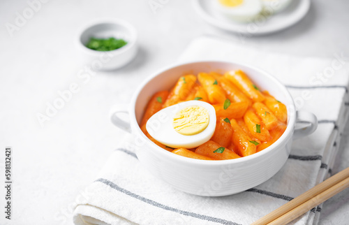 Tteokbokki. Traditional korean rice sticks in hot spicy sauce