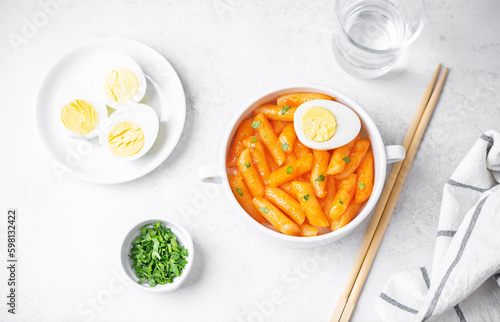 Tteokbokki. Traditional korean rice sticks in hot spicy sauce photo