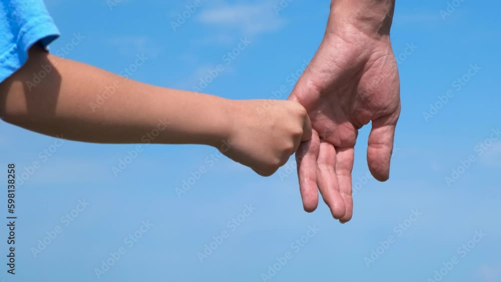 Hold mum hand with love against sky. A view of little child hand hold woman finger in the open air. Generative AI Hold mum hand with love against sky. A view of little child hand hold woman finger in the open air. Generative AI