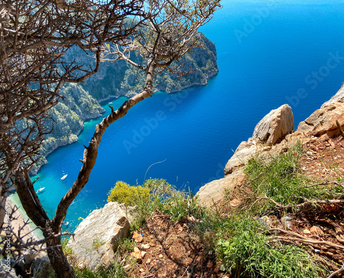 Butterfly Valley (Turkish: Kelebekler Vadisi) is a valley in Fethiye district, Mugla Province, on the Mediterranean coast of Turkey. Oludeniz - Fethiye, Mugla, Turkey.