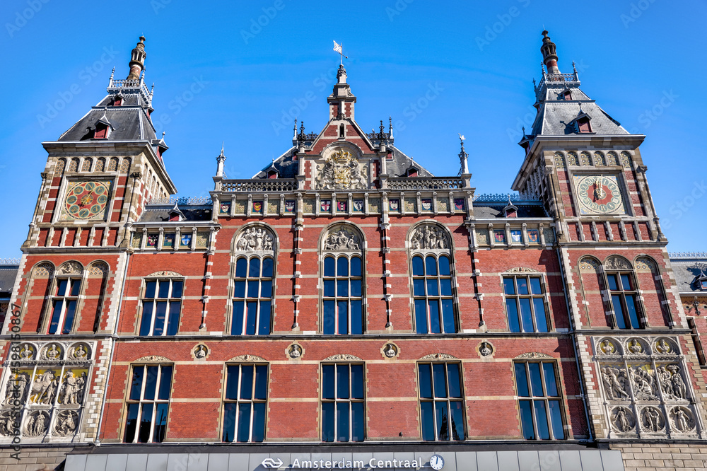 Amsterdam, Netherlands - March 28, 2023: Exterior of the historic Amsterdam Centraal rail terminal

