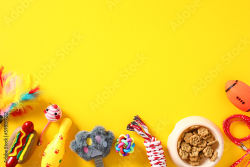 Pet store banner template. Flat lay composition with pet accessories and toys on yellow background