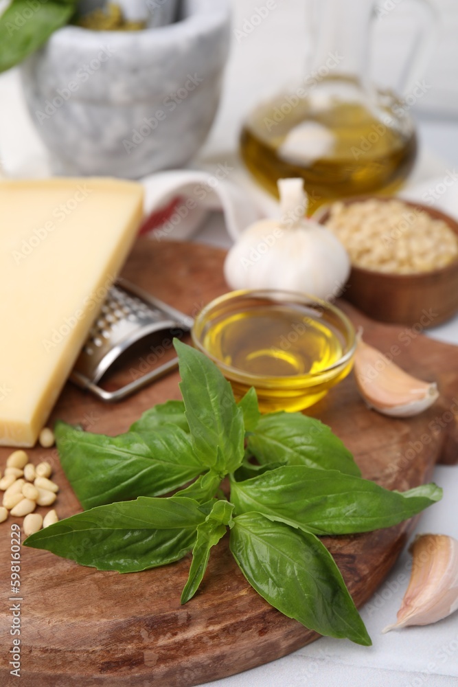 Different ingredients for cooking tasty pesto sauce on table Different ingredients for cooking tasty pesto sauce on table