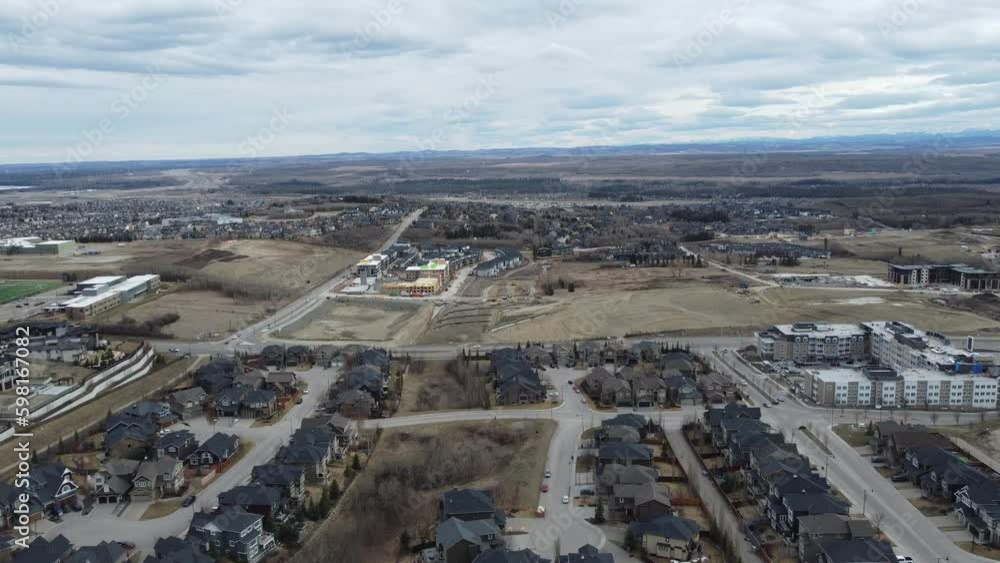 Aerial view of a modern suburban community in Calgary, Canada, in spring after the snow melt. Aerial view of a modern suburban community in Calgary, Canada, in spring after the snow melt.