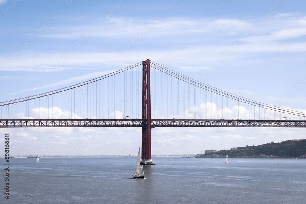 The 25 April Bridge or Ponte 25 Abril located in Lisbon, Portugal. First suspension bridge over Tagus River