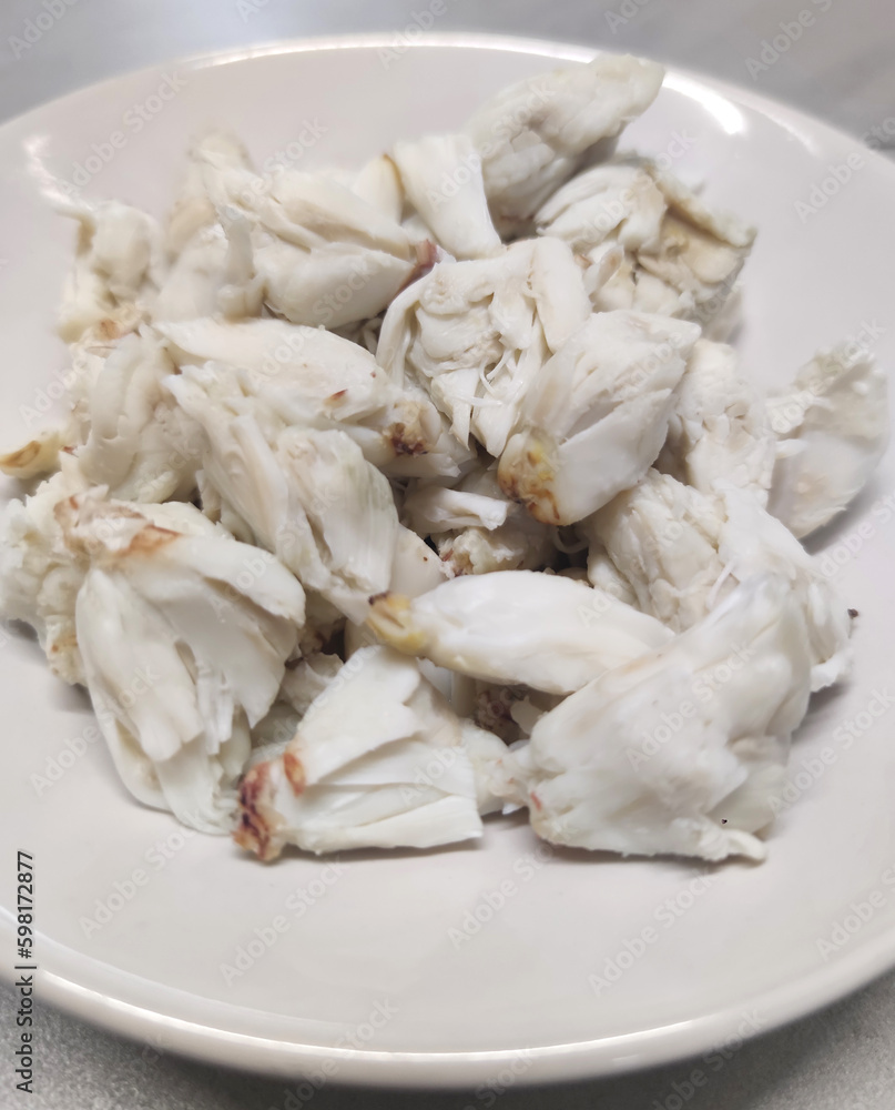Full plate of steamed fresh stone crab meat, Cheliped of the crab, prepared raw shell animal at homemade gourmet restaurant Full plate of steamed fresh stone crab meat, Cheliped of the crab, prepared raw shell animal at homemade gourmet restaurant
