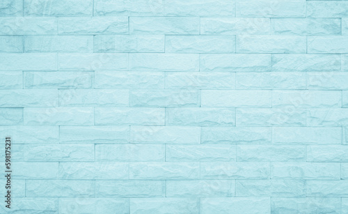 Detail of modern blue brick wall background photo. Blue light brick wall texture background for stone tile block painted in white light color wallpaper modern interior and exterior backdrop design.