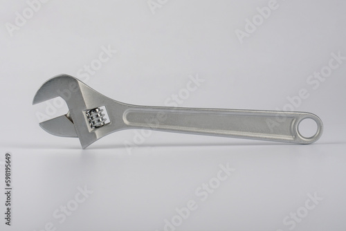 a wrench isolated on white background. © apinya