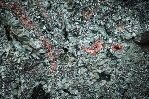 rough hematite with hematoid quartz. macro detail texture background. close-up raw rough unpolished semi-precious gemstone
 photo