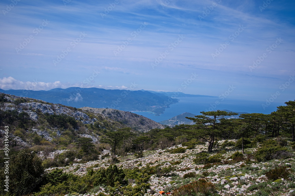 Panorama of karst landscape in Croatia with Adriatic sea in background