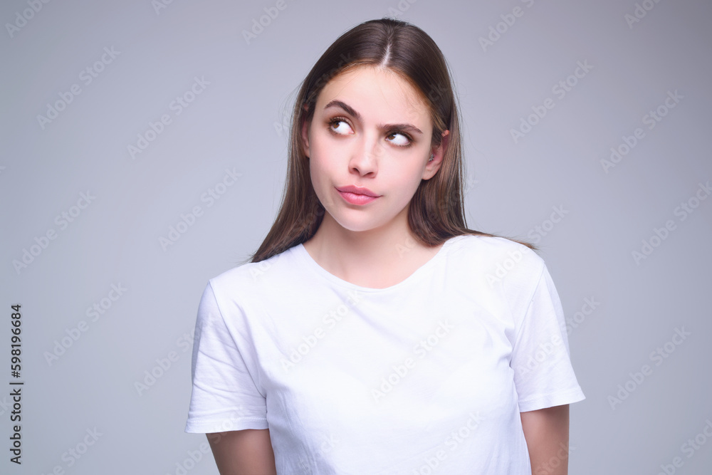 Emotional student girl shocked with news covering mouth with hands. Young emotional woman. The human emotions, facial expression concept. Amazed girl with shocked facial expression. Emotional student girl shocked with news covering mouth with hands. Young emotional woman. The human emotions, facial expression concept. Amazed girl with shocked facial expression.