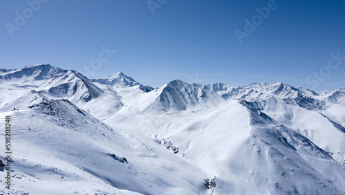 snowy mountain peaks. snow cliffs. the icy desert. snowy expanses