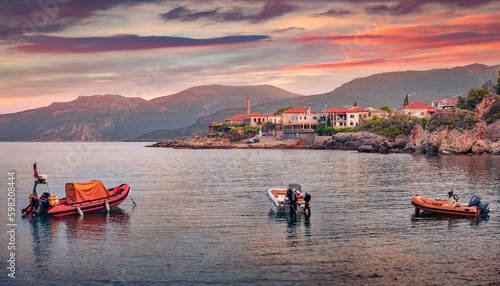 Calm morning view of Kardamyli port. Wonderful summer scene of Peloponnese peninsula with three motorboats, Greece, Europe. Vacation concept background.