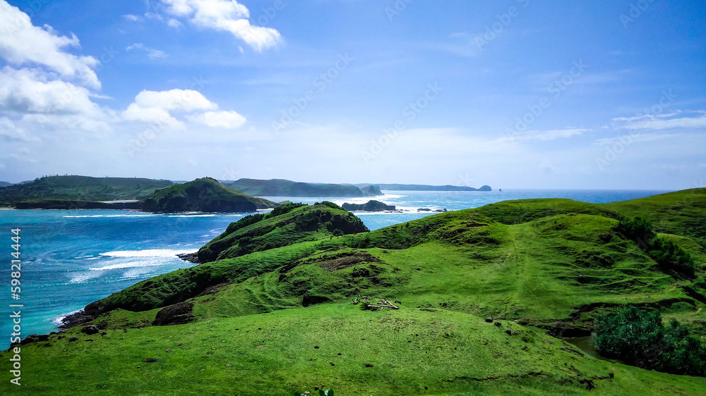 Hill and the ocean view from Merese hill, Mandalika, Lombok island, Indonesia Hill and the ocean view from Merese hill, Mandalika, Lombok island, Indonesia