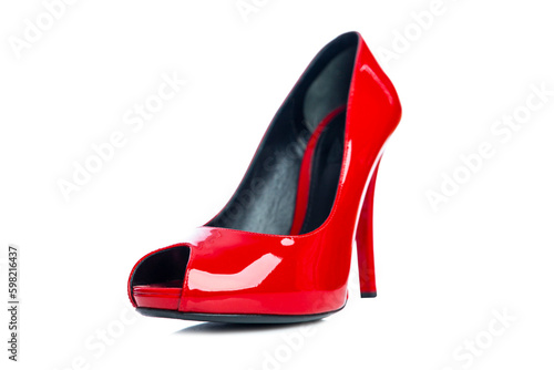 Elegant red patent leather women's shoes with high heels. Style, fashion and beauty. Isolated on white background.