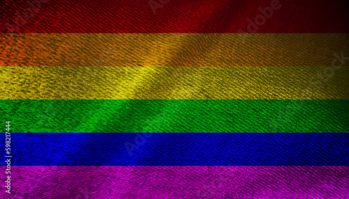 Abstract Pride gay flag grunge dark background. Rainbow flag painted on a piece of cloth or fabric with a grunge effect. Use it for national day and LGBTQ events concept.