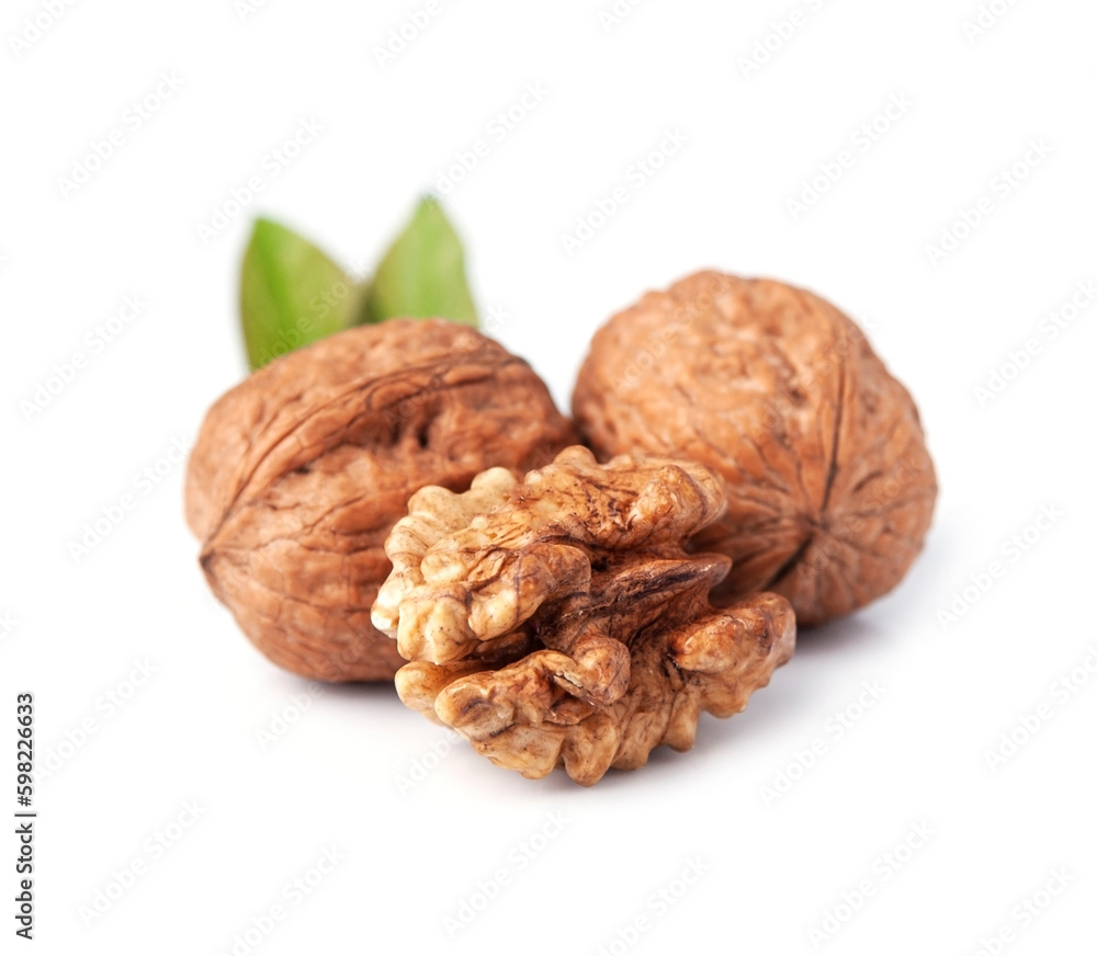 Walnuts with leaves on white backgrounds Walnuts with leaves on white backgrounds