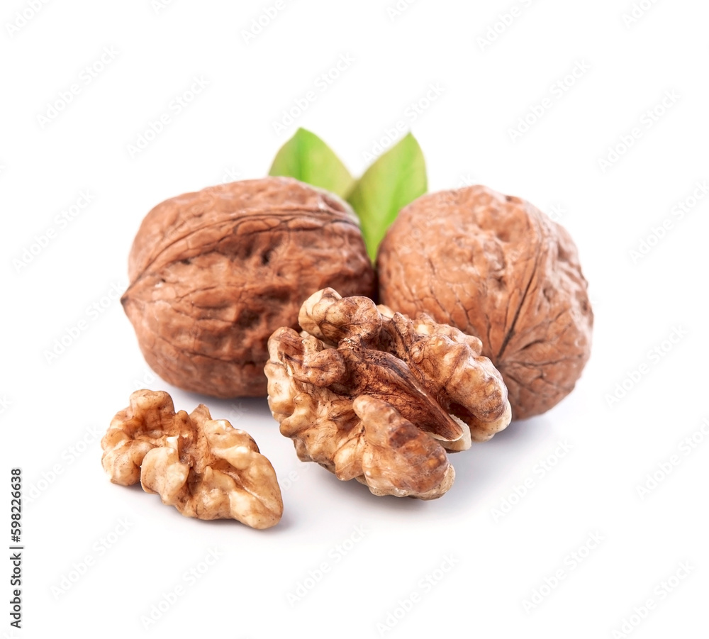 Walnuts with leaves on white backgrounds Walnuts with leaves on white backgrounds