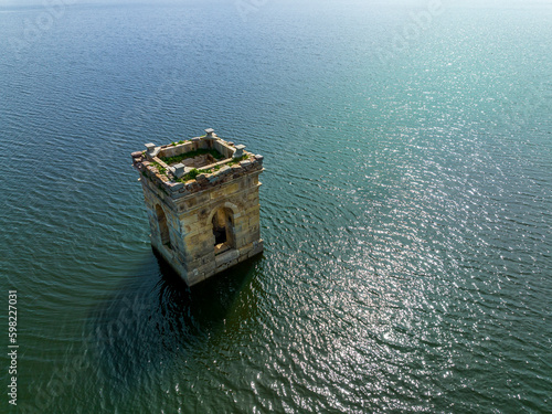 Cuerda del Pozo reservoir on the Duero river view of the bell tower of the church of La Muedra Soria province photo