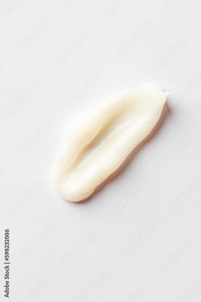 Top view of white cream smear, cosmetic swatch and sample. Top view of white cream smear, cosmetic swatch and sample.