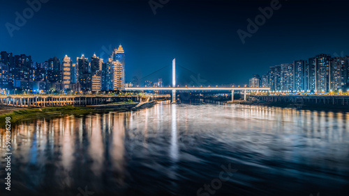 This is the Shimen Bridge in the Shapingba district of Chongqing, China, which connects the Shapingba district and Jiangbei district of Chongqing.