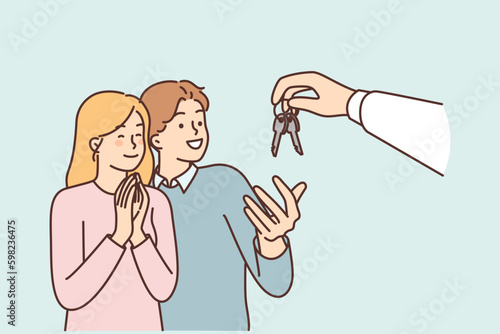 Couple takes keys from hand of realtor or real estate agent who rents out apartment in good area Generative AI