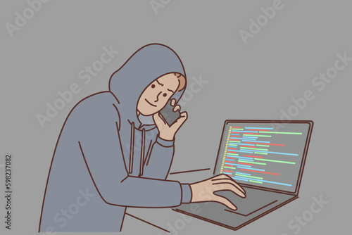 Man hacker with laptop and making phone call is engaged in telecom fraud and scamming money already Generative AI