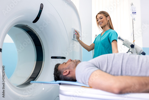 Cuadro en lienzo Female Doctor Looking At Patient Undergoing CT Scan