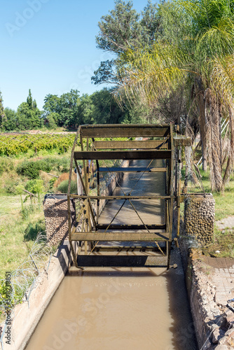 Irrigation canal and waterwheel in Keimoes photo